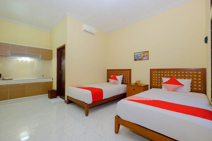 Imagen de la habitación del Hotel OYO 2864 Mangsit Garden Homestay. Foto 15