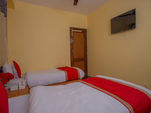 Imagen de la habitación del Hotel OYO 287 Buddha Palace. Foto 8