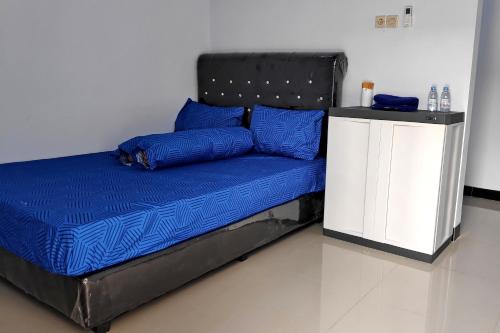 Imagen de la habitación del Hotel OYO 2873 Griya Annisa. Foto 9
