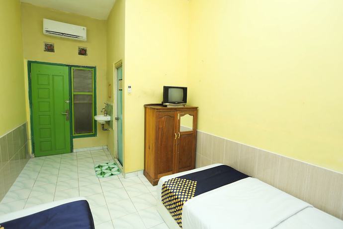 Imagen de la habitación del Hotel OYO 2879 Pondok Bunda Syariah. Foto 8