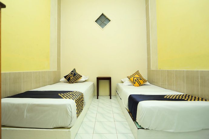 Imagen de la habitación del Hotel OYO 2879 Pondok Bunda Syariah. Foto 9