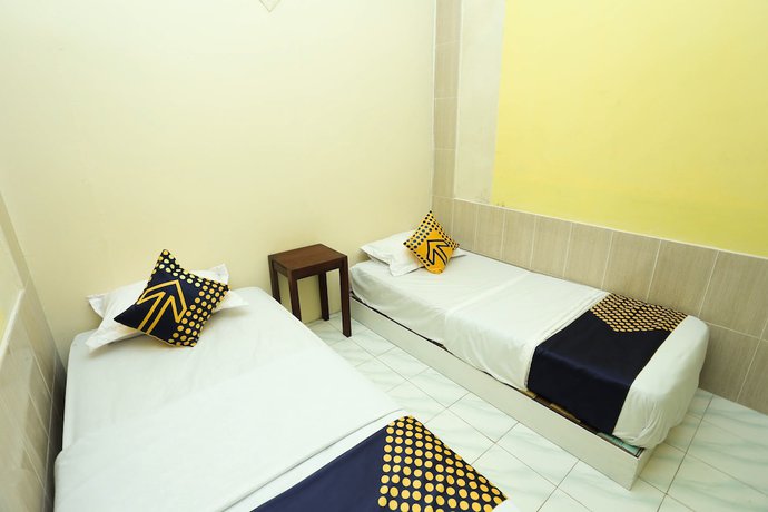 Imagen de la habitación del Hotel OYO 2879 Pondok Bunda Syariah. Foto 16