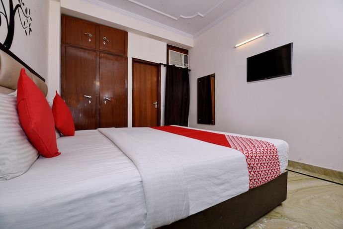 Imagen de la habitación del Hotel OYO 2895 Cosy Tree Rooms. Foto 5