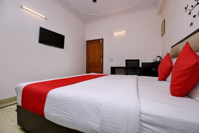 Imagen de la habitación del Hotel OYO 2895 Cosy Tree Rooms. Foto 6