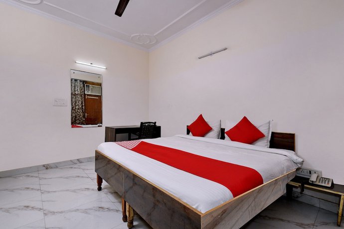 Imagen de la habitación del Hotel OYO 2895 Cosy Tree Rooms. Foto 7