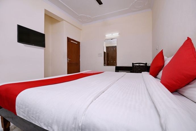 Imagen de la habitación del Hotel OYO 2895 Cosy Tree Rooms. Foto 8
