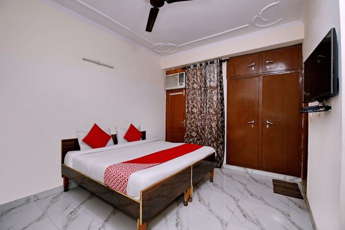 Imagen de la habitación del Hotel OYO 2895 Cosy Tree Rooms. Foto 10