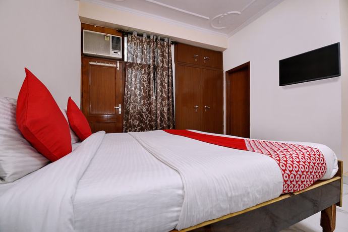 Imagen de la habitación del Hotel OYO 2895 Cosy Tree Rooms. Foto 11