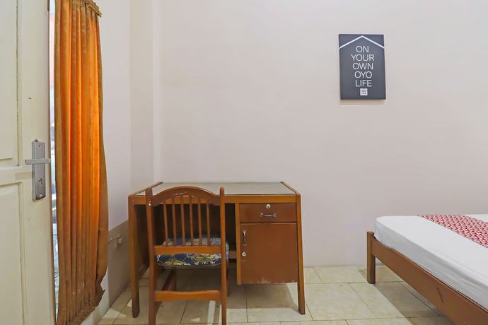Imagen de la habitación del Hotel OYO 2899 Ardilia Bandara Syariah. Foto 3