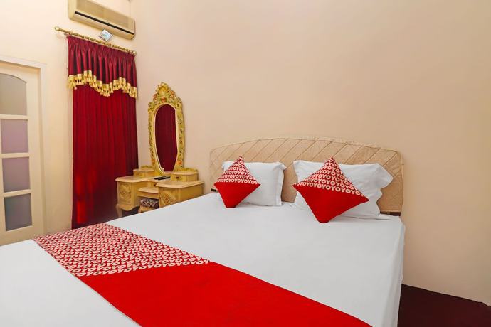 Imagen de la habitación del Hotel OYO 2899 Ardilia Bandara Syariah. Foto 5