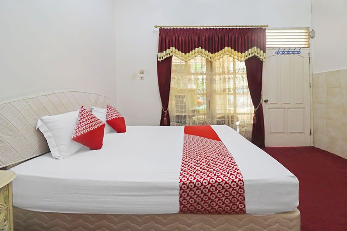 Imagen de la habitación del Hotel OYO 2899 Ardilia Bandara Syariah. Foto 9