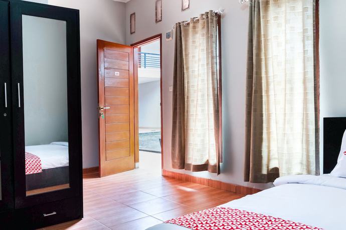 Imagen de la habitación del Hotel OYO 2912 Graha Minda Syariah. Foto 7