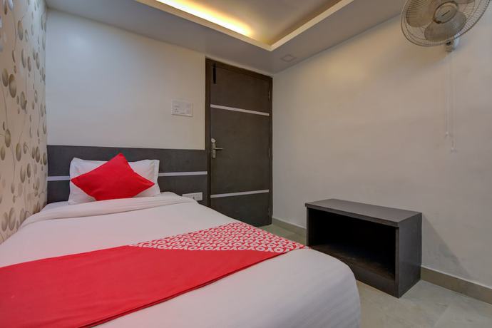 Imagen de la habitación del Hotel OYO 29204 Blue Sapphire. Foto 9