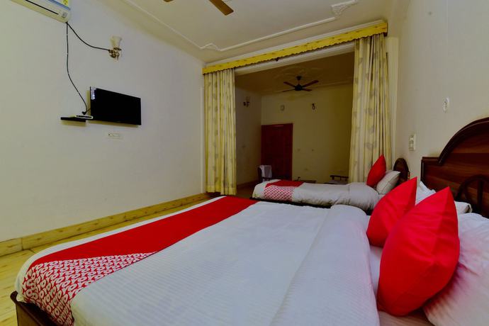 Imagen de la habitación del Hotel OYO 29302 Besillio Grand Hotel. Foto 8