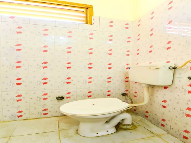 Imagen de la habitación del Hotel OYO 29302 Besillio Grand Hotel. Foto 15