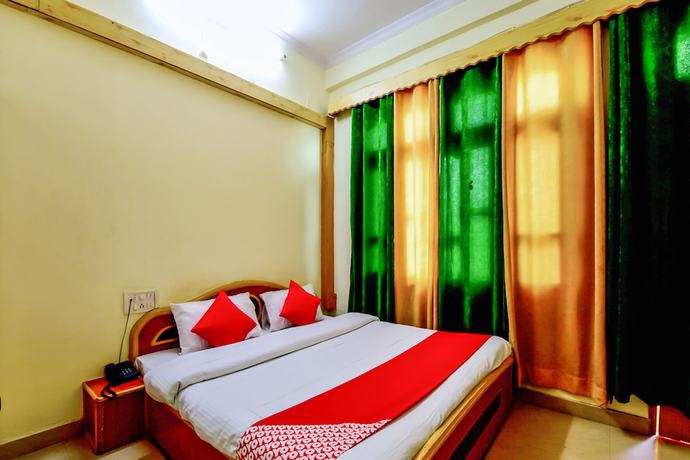 Imagen de la habitación del Hotel OYO 29302 Besillio Grand Hotel. Foto 17