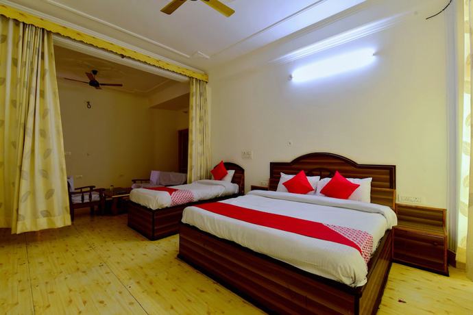 Imagen de la habitación del Hotel OYO 29302 Besillio Grand Hotel. Foto 18