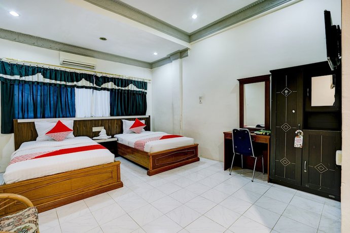 Imagen de la habitación del Hotel OYO 2972 Wisma Sartika. Foto 7