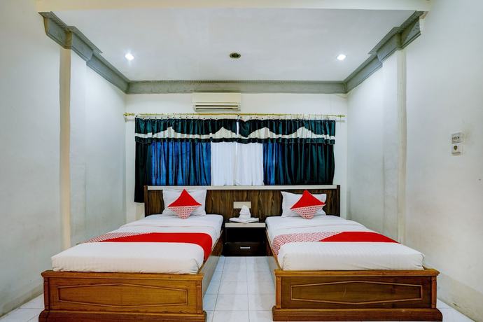 Imagen de la habitación del Hotel OYO 2972 Wisma Sartika. Foto 11