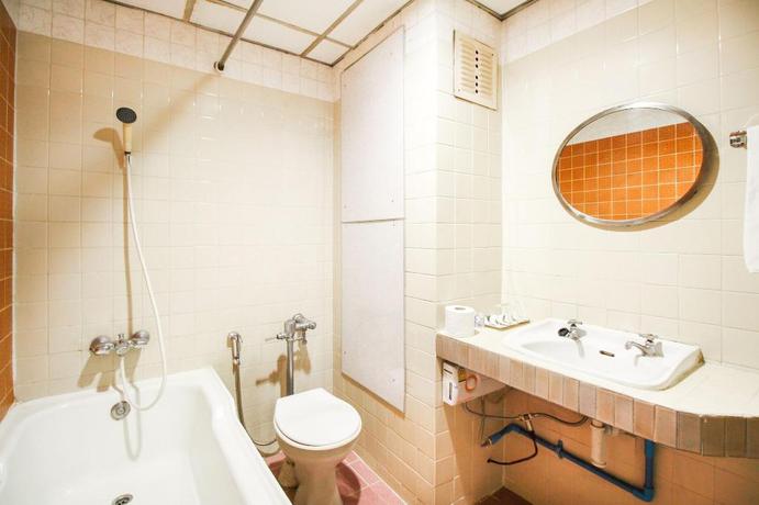 Imagen de la habitación del Hotel OYO 299 CROWN BTS NANA HOTEL. Foto 14