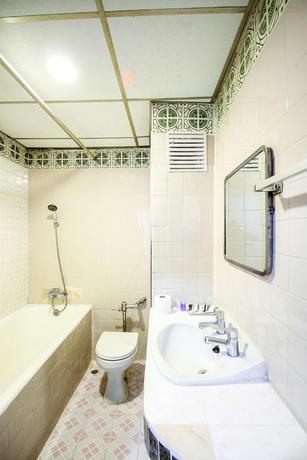 Imagen de la habitación del Hotel OYO 299 CROWN BTS NANA HOTEL. Foto 15