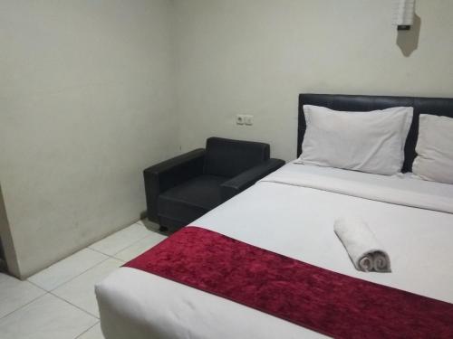 Imagen de la habitación del Hotel OYO 2991 Satya Residence. Foto 9