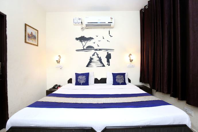 Imagen de la habitación del Hotel OYO 3004 Star City. Foto 9