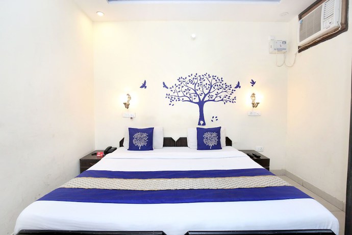 Imagen de la habitación del Hotel OYO 3004 Star City. Foto 13