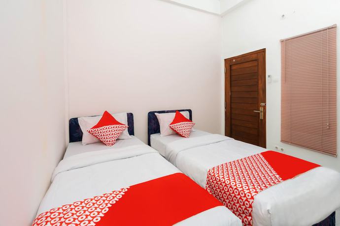 Imagen de la habitación del Hotel OYO 3006 Falisha Homestay Syariah. Foto 2