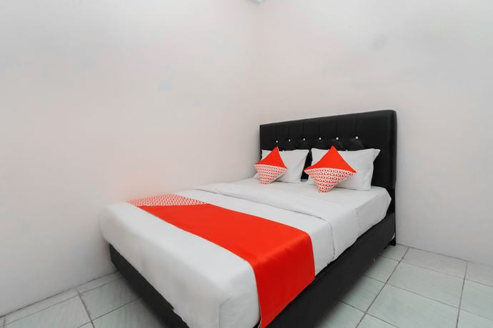 Imagen de la habitación del Hotel OYO 3006 Falisha Homestay Syariah. Foto 7