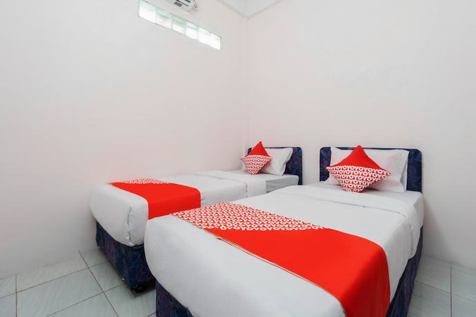 Imagen de la habitación del Hotel OYO 3006 Falisha Homestay Syariah. Foto 8
