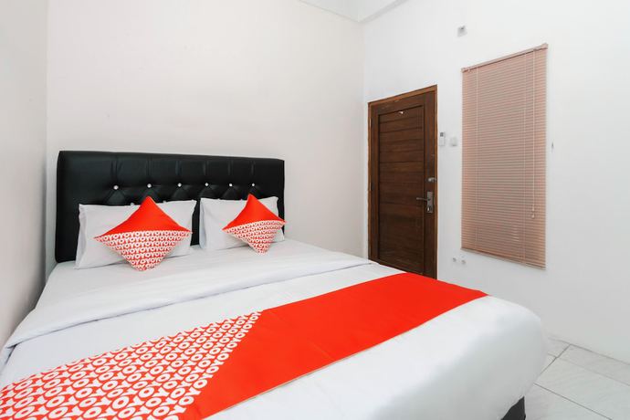 Imagen de la habitación del Hotel OYO 3006 Falisha Homestay Syariah. Foto 9