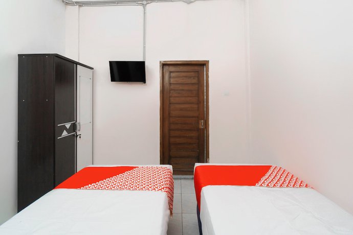 Imagen de la habitación del Hotel OYO 3006 Falisha Homestay Syariah. Foto 11