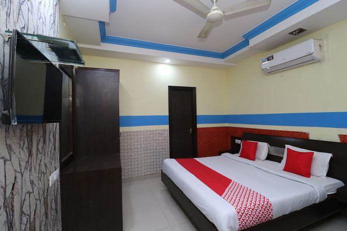 Imagen de la habitación del Hotel OYO 30100 Lucky Guest House. Foto 3