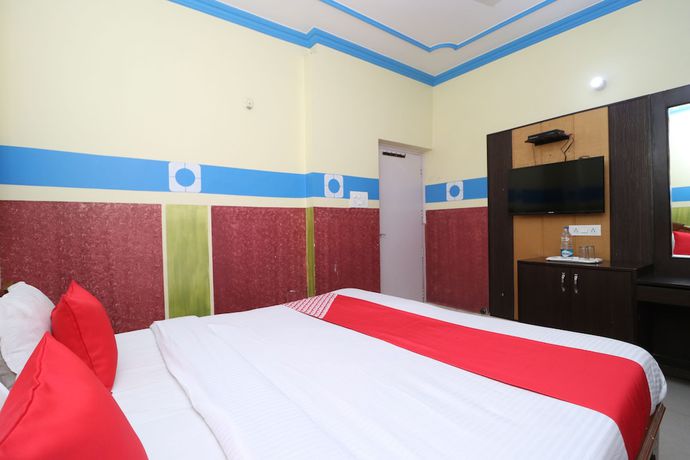 Imagen de la habitación del Hotel OYO 30100 Lucky Guest House. Foto 8