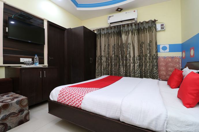 Imagen de la habitación del Hotel OYO 30100 Lucky Guest House. Foto 10