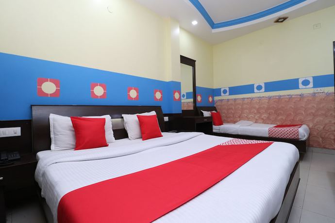 Imagen de la habitación del Hotel OYO 30100 Lucky Guest House. Foto 14