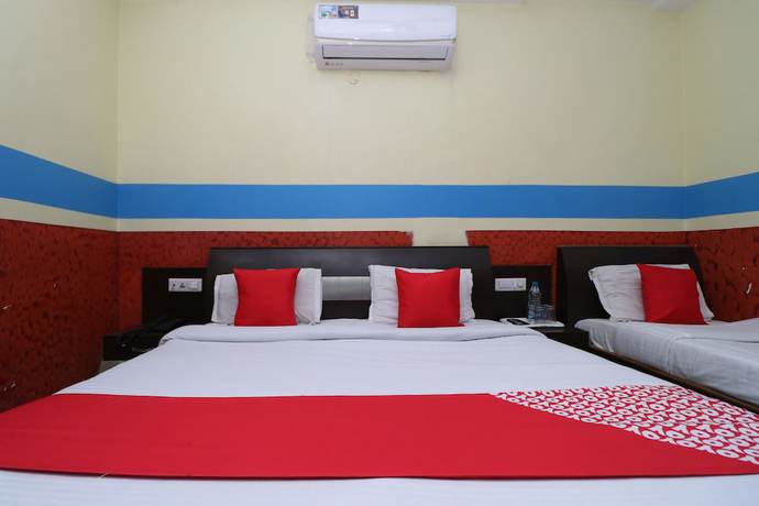Imagen de la habitación del Hotel OYO 30100 Lucky Guest House. Foto 16