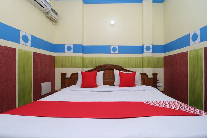 Imagen de la habitación del Hotel OYO 30100 Lucky Guest House. Foto 17