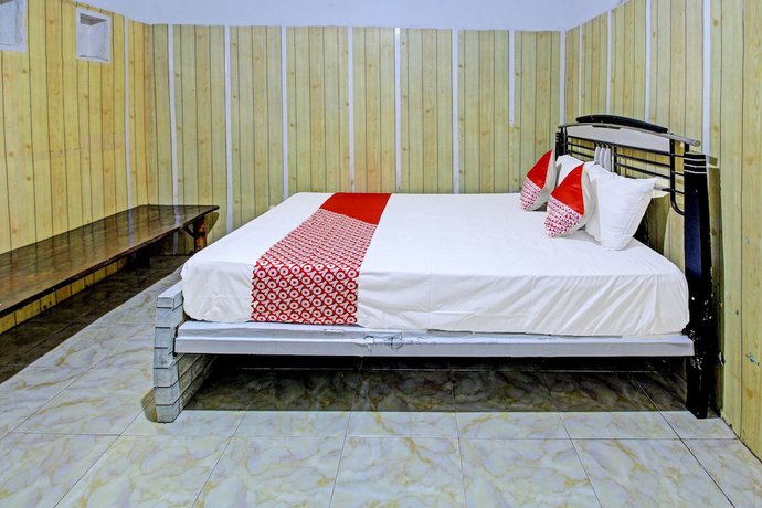 Imagen de la habitación del Hotel OYO 3012 Coupis Guesthouse Syariah. Foto 6