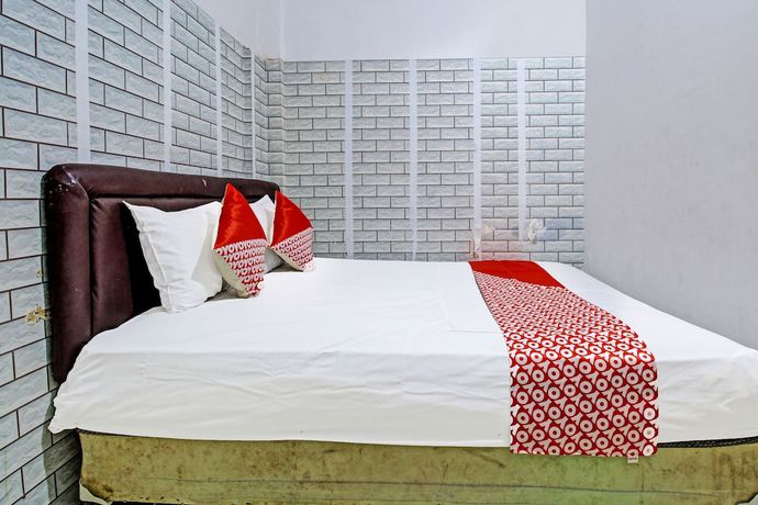 Imagen de la habitación del Hotel OYO 3012 Coupis Guesthouse Syariah. Foto 7