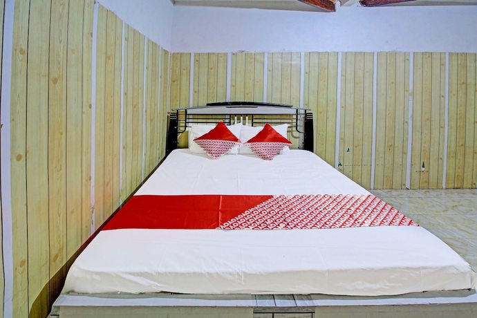 Imagen de la habitación del Hotel OYO 3012 Coupis Guesthouse Syariah. Foto 9