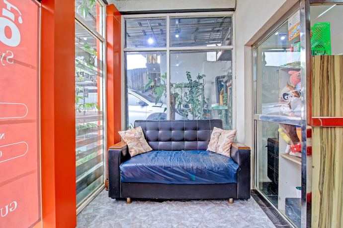 Imagen de los interiores del Hotel OYO 3012 Coupis Guesthouse Syariah. Foto 20