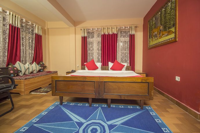 Imagen de la habitación del Hotel OYO 30417 Green View Neelgiri. Foto 4