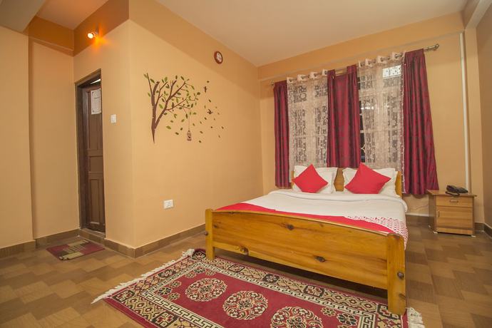 Imagen de la habitación del Hotel OYO 30417 Green View Neelgiri. Foto 7