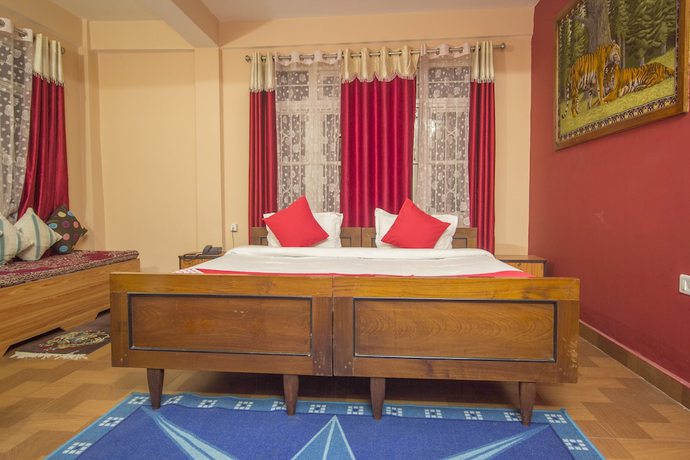 Imagen de la habitación del Hotel OYO 30417 Green View Neelgiri. Foto 9