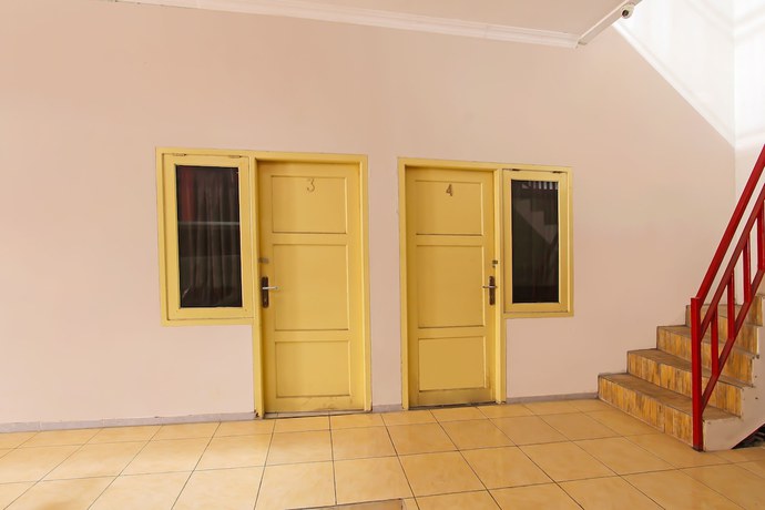 Imagen de los interiores del Hotel OYO 3060 Al Fatih Guest House Syariah. Foto 12