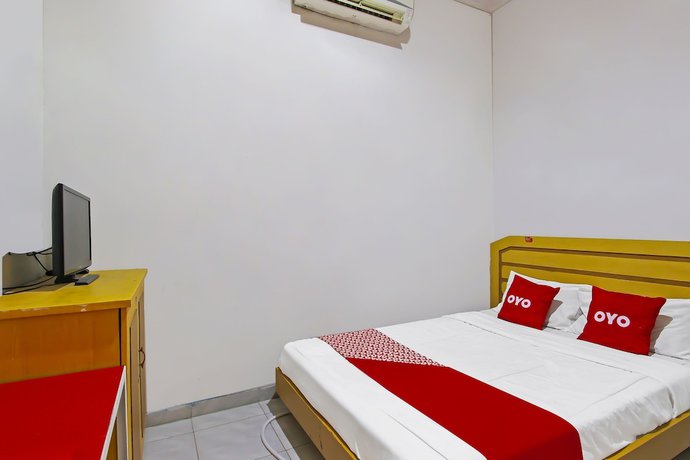 Imagen de la habitación del Hotel OYO 3060 Al Fatih Guest House Syariah. Foto 3