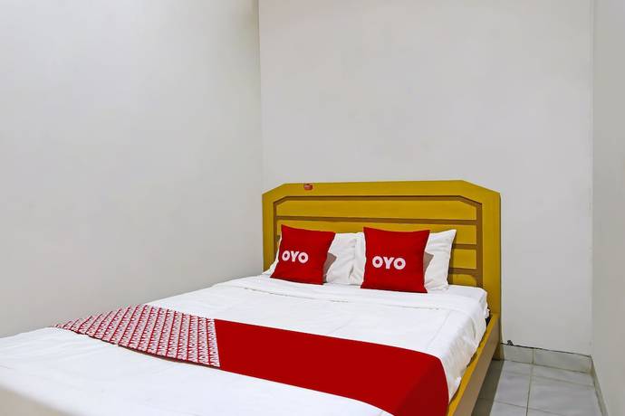 Imagen de la habitación del Hotel OYO 3060 Al Fatih Guest House Syariah. Foto 4