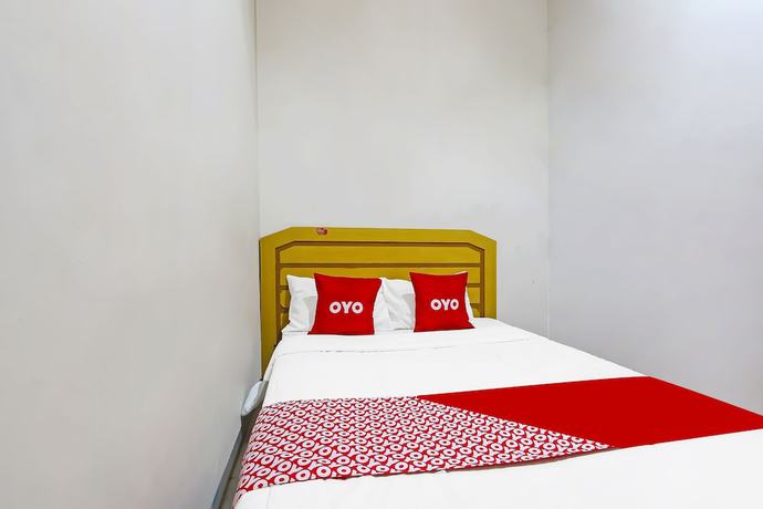 Imagen de la habitación del Hotel OYO 3060 Al Fatih Guest House Syariah. Foto 5